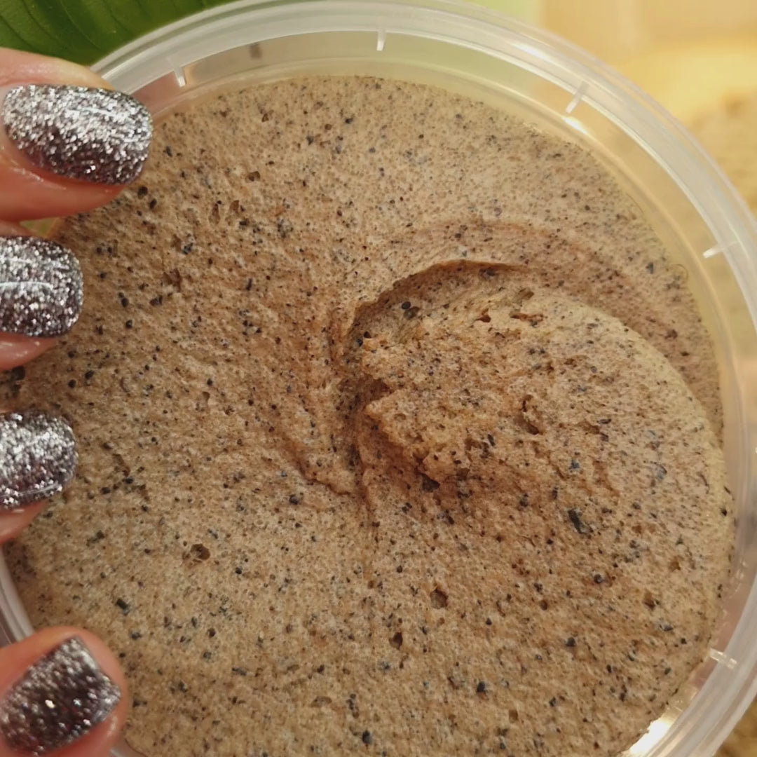 a woman's hand holding a plastic container of food